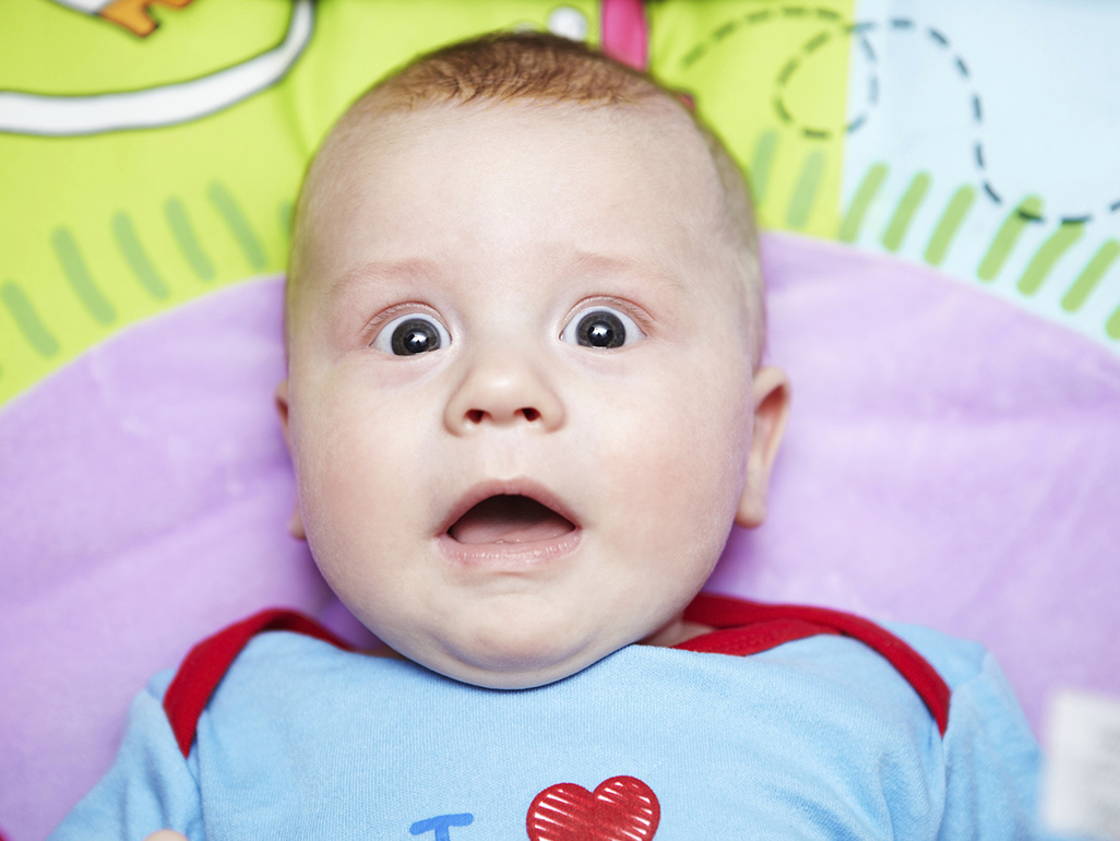 baby with a surprised face expression