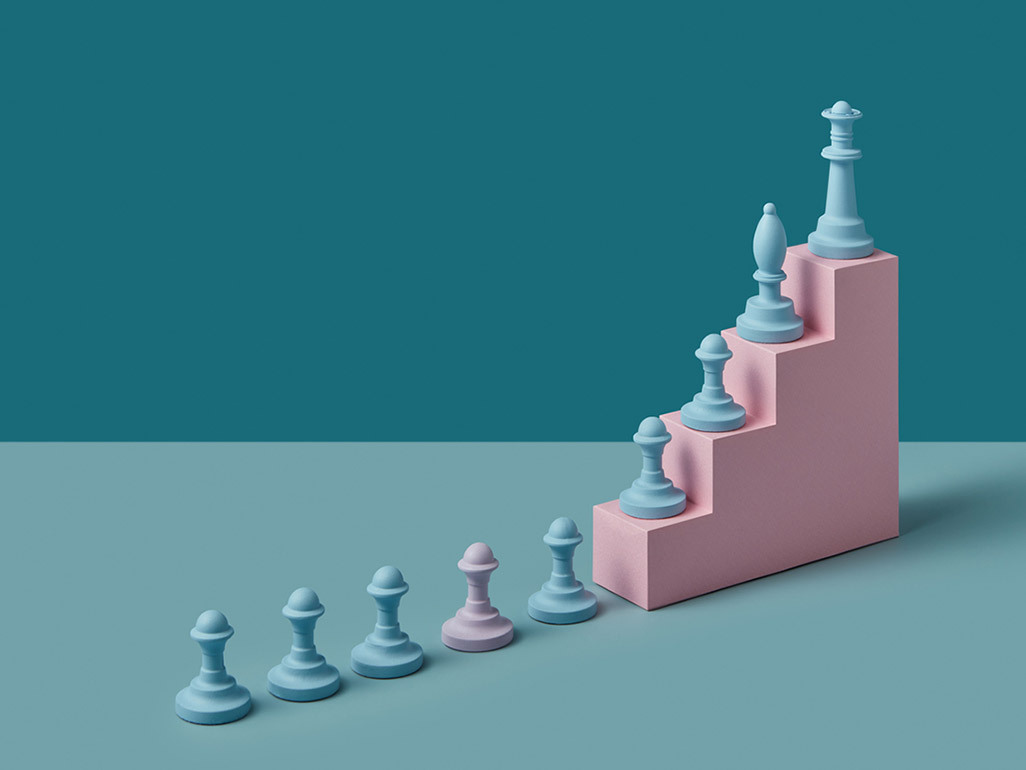 blue and pink chess pieces lined up representing legacy