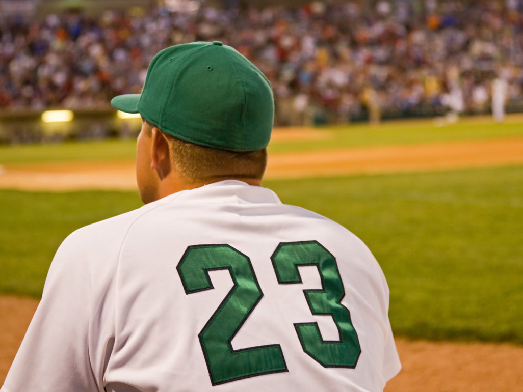 back of a baseball player with number 23 on jersey